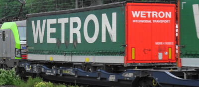 WETRON Transport & Logistics, NEUES LOGO - Schmitz Auflieger H0